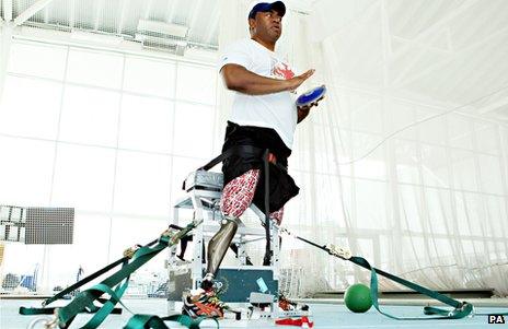 Paralympic discus thrower Derek Derenalagi with his "bionic leg"