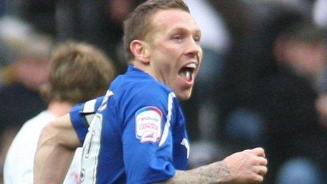 Cardiff City's Craig Bellamy celebrates scoring the winner against Swansea City in 2011