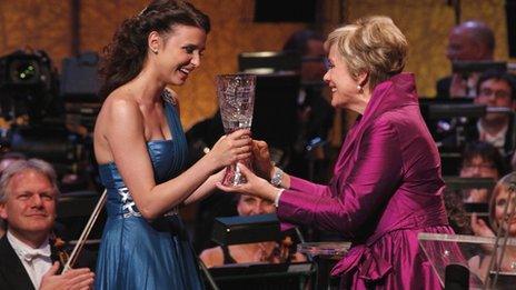 Dame Kiri Te Kanawa presents the Cardiff Singer of the World trophy to 2011 winner Valentina Nafornita