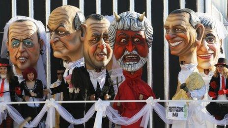 Carnival float with masks of Italian politicians Angelino Alfano, Luigi Bersani, Antonio Di Pietro, Beppe Grillo (devil), Silvio Berlusconi and Niki Vendola