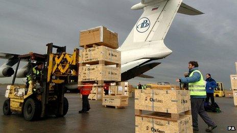 Oxfam aid being loaded on plane in 2004