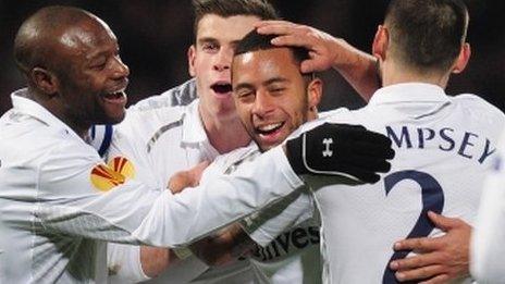 Tottenham celebrate with goalscorer Moussa Dembele