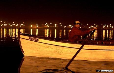 Andrew Turner in his boat at Sangam