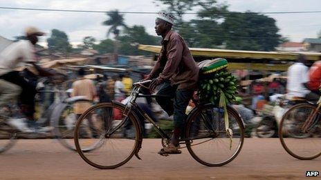 (File photo 2008) a man rides a bicycle in Kampala