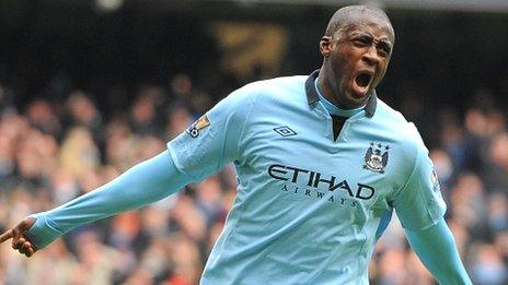 Yaya Toure celebrates his opening goal