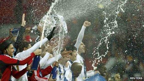 Swansea City players celebrate their Wembley victory