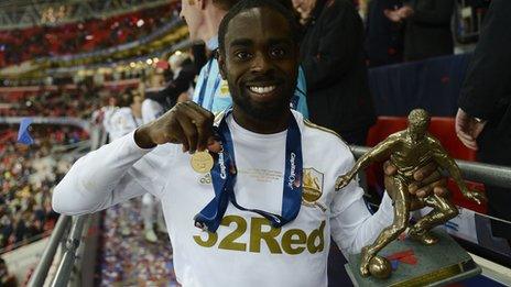 Nathan Dyer collects his man-of-the-match award