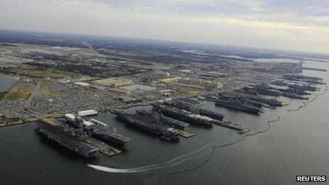 US aircraft carriers are pictured in port at at Naval Station Norfolk, Virginia