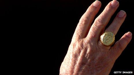 Papal ring hand