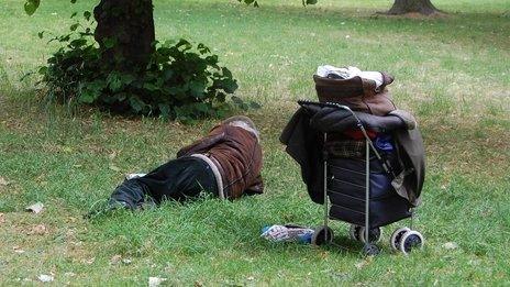 A homeless man sleeps rough