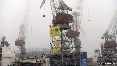 Greenpeace activists protest at the port of Helsinki against Shell's activities in the Arctic