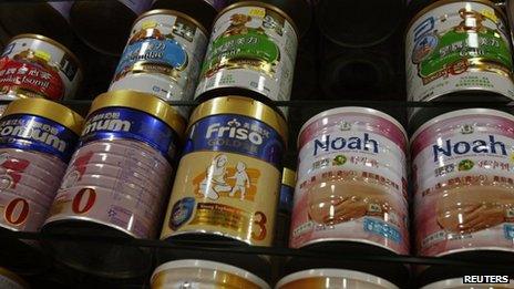 Baby milk formula are displayed inside a pharmacy in Hong Kong