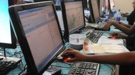 People on computers at a call centre in Kenya - 1 March 2013