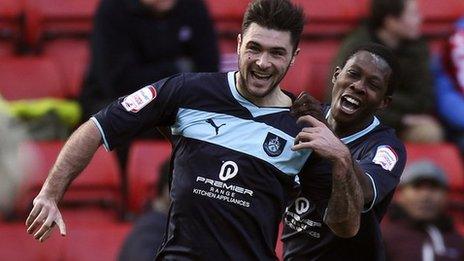 Burnley striker Charlie Austin (left)