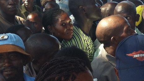 People queuing at the polling station near Mombasa where police officers were killed - 4 March 2013