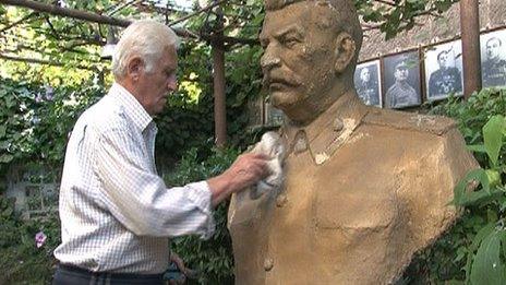 Ushangi Davitashvili and one of his Stalin statues