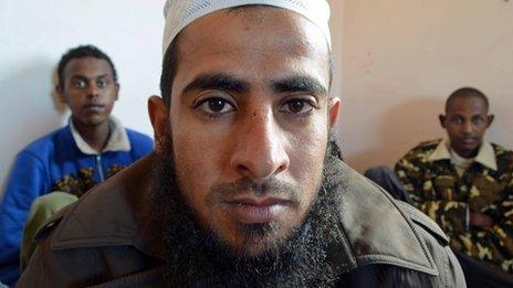 Sheikh Mohammed al Maniri with hostages he has rescued