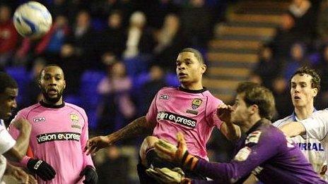 Dean Leacock (centre) in action for Notts