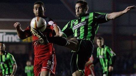 Matthew Upson clears for Brighton at Bristol City