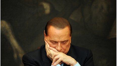 A file picture taken on February 1, 2012 at the Italian parliament in Rome shows Italy's former Prime Minister Silvio Berlusconi