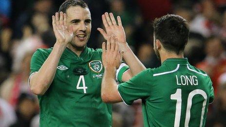 John O'Shea and Shane Long of the Republic of Ireland