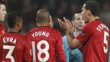 Rio Ferdinand claps referee