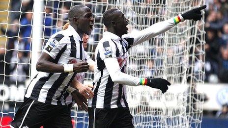 Papiss Cisse (right) celebrates the winner for Newcastle against Stoke