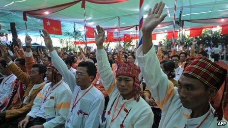Delegates of National League for Democracy (NLD) vote during the first- ever party conference at the Royal Rose Hall in Rangoon, Burma on 9 March 2013