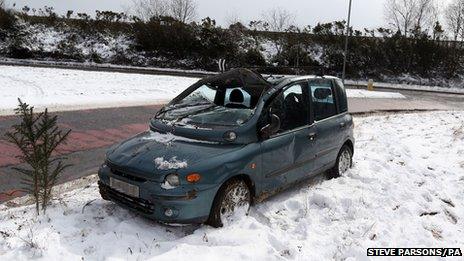 A car left abandoned at Pease Pottage following a crash