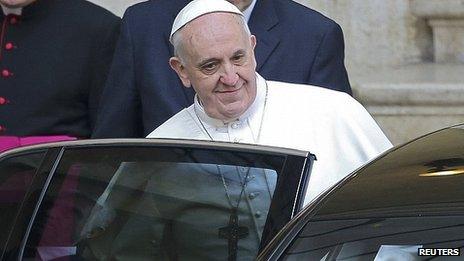 Pope Francis leaves after praying at Santa Maria Maggiore Basilica in Rome. 14 March 2013