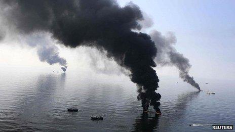 Smoke rises from a controlled burn of the Deepwater Horizon oil spill in 2010