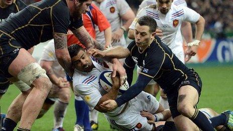 France lock Sebastien Vahaamahina is tackled by Scotland scrum-half Greig Laidlaw