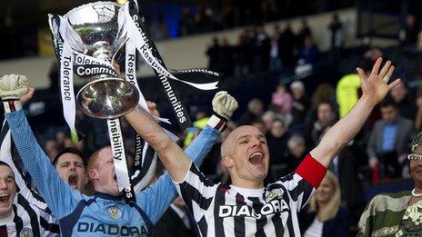 St Mirren skipper Jim Goodwin lifts the League Cup