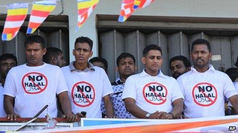 Sri Lanka’s hardline Buddhist group Bodhu Bala Sena members wear T- shirts urging boycott of consumer goods with Halal certification during a protest rally in Maharagama on the outskirts of Colombo, Sri Lanka, Sunday, Feb. 17, 2013