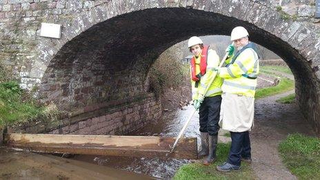 Deputy Minister for Skills and Technology Jeff Cuthbert, and Liam Davies, an apprentice bricklayer with the Canal & River Trust