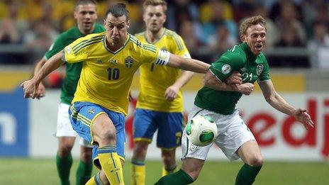 Zlatan Ibrahimovic battles with Paul Green in Stockholm