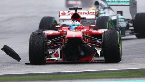 Fernando Alonso's nose-cone falls apart