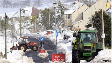 Tractors clear roads of snow in Northern Ireland