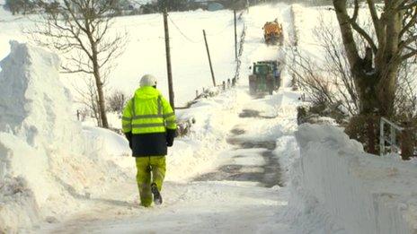 Crews work through snow