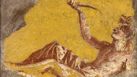 Fragment of a wall painting showing a man reclining to drink