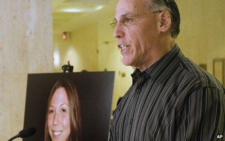 Irv Hoffman with a photograph of his daughter Rachel