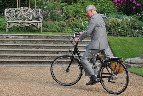 Prince Charles tries out an electric bike