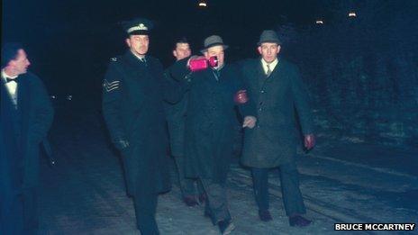 Rev Brydon Maben arrest – following a community protest in which village protestors, led by local minister the Reverend Brydon Maben, blocked the passage of the last train at Newcastleton level crossing, Maben is led away by police officers. He was released following a plea by David Steel MP to protestors to lift the blockade, and the last train proceeded to Carlisle and London, two hours late.