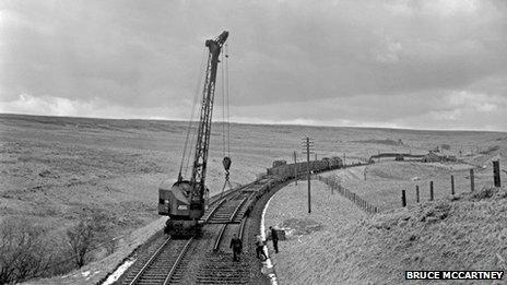 Contractors lift a section of track near Whitrope in late 1969