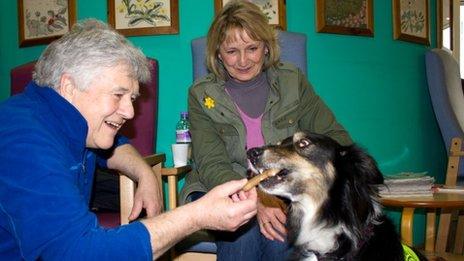 Charlie with patients at the centre