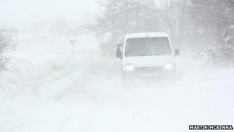 Van in blizzard