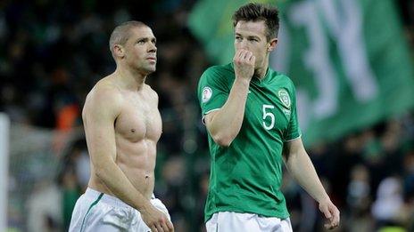 Jonathan Walters and Sean St Ledger walk off the pitch after the Republic's 2-2 draw against Austria