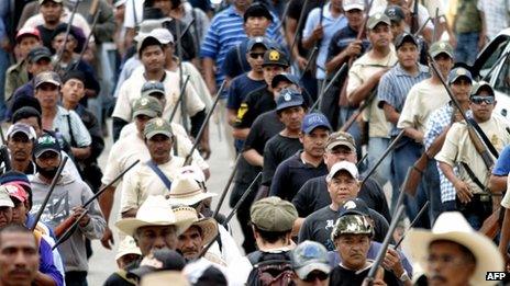 Armed vigilantes marching in Ayutla de los Libres, Guerrero State, 2 March 2013