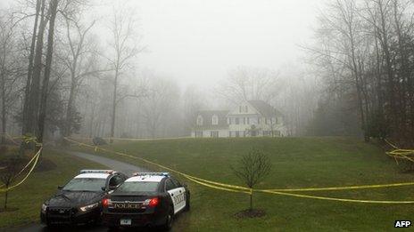 Police outside the home of Nancy Lanza in Newtown, Connecticut on 18 December 2012