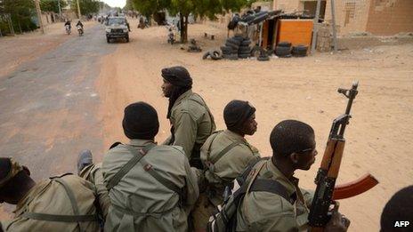 Malian soldiers enter the historic city of Timbuktu in January 2013, previously occupied for 10 months by Islamists